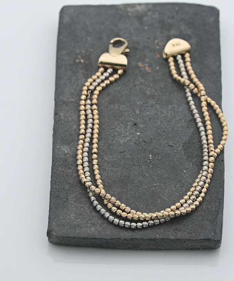 צמיד ברוחב 55 מ"מ, שלוש שורות כדורי זהב עם חיתוכי לייזר - מק"ט 15391, זהב 14K