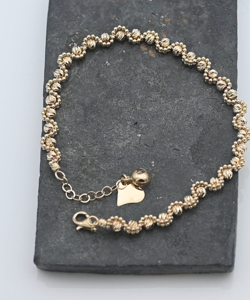 צמיד כדורי זהב עם חיתוכי לייזר - מק"ט 15920, זהב 14K